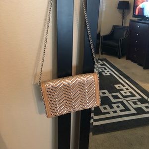 Chain strap metallic and tan weaved crossbody bag